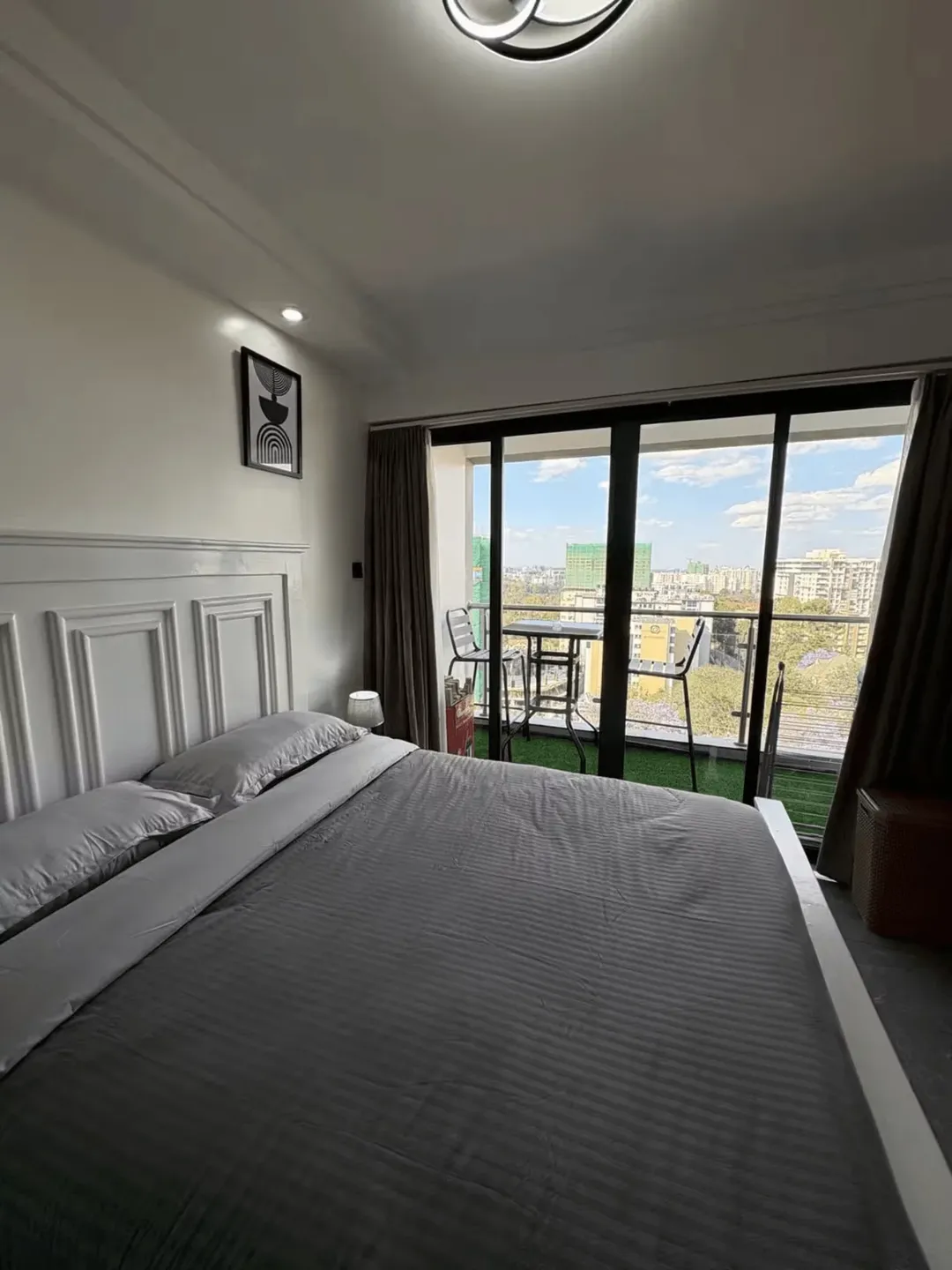 Cozy 1BR | Balcony Views | Rooftop Gym - Image 12