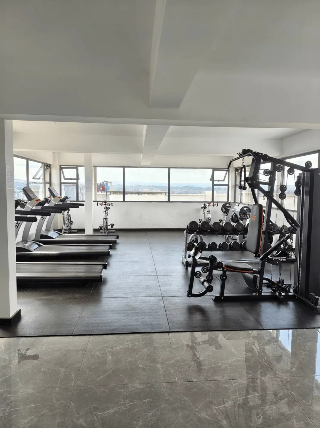 Cozy 1BR | Balcony Views | Rooftop Gym - Image 17