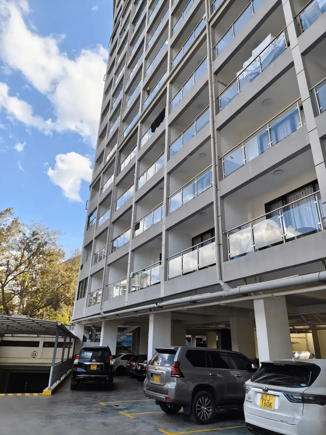 Cozy 1BR | Balcony Views | Rooftop Gym - Image 18